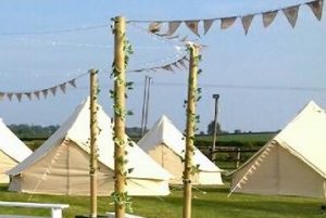 tented village at a rural wedding